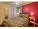 Cozy bedroom featuring a ceiling fan and hardwood floors at 221 Las Fuentes Dr, Kissimmee, FL 34746