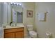 Clean and well-maintained bathroom with a single sink, toilet, and shower at 221 Las Fuentes Dr, Kissimmee, FL 34746