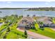 Luxury waterfront home with expansive lake views and private dock at 13016 Shady Retreat Loop, Clermont, FL 34711