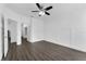 Spacious bedroom with wood-look floors and ceiling fan at 132 Vista Verdi Cir # 220, Lake Mary, FL 32746