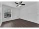 Well-lit bedroom with wood-look floors and window at 132 Vista Verdi Cir # 220, Lake Mary, FL 32746