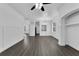 Open concept living room with dark floors and neutral decor at 132 Vista Verdi Cir # 220, Lake Mary, FL 32746