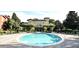 Inviting community pool with surrounding lounge chairs and landscaping at 132 Vista Verdi Cir # 220, Lake Mary, FL 32746