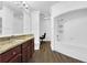 Updated bathroom with granite vanity, soaking tub, and walk-in shower at 132 Vista Verdi Cir # 220, Lake Mary, FL 32746