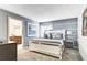 Elegant Primary bedroom with a king-size bed and modern decor at 690 Pebble Beach Dr, Davenport, FL 33896