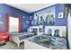 bedroom with twin beds and a superhero-themed mural at 690 Pebble Beach Dr, Davenport, FL 33896