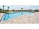 Inviting community pool with ample deck space for lounging at 1242 Normandy Dr, Haines City, FL 33844