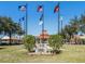 Memorial park with gazebo and flags representing military branches at 1242 Normandy Dr, Haines City, FL 33844