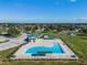 Relaxing community pool with a splash pad at 1242 Normandy Dr, Haines City, FL 33844