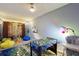 Fun playroom with foosball table, beanbag chairs, and playful decor at 17833 Woodcrest Way, Clermont, FL 34714