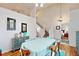 Bright dining area with hardwood floors and view of staircase at 17833 Woodcrest Way, Clermont, FL 34714
