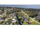 Aerial view of waterfront homes and canal at 12009 Eagle Point Ct, Leesburg, FL 34788