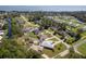 Aerial view of homes near a lake at 12009 Eagle Point Ct, Leesburg, FL 34788