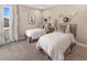 Twin bedroom with light decor and animal wall art at 9179 Breeze Mist Ter, Kissimmee, FL 34747