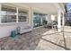 Covered patio with seating area and pool views at 9179 Breeze Mist Ter, Kissimmee, FL 34747