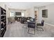 Upstairs loft area with seating, a table, and built-in shelving at 9179 Breeze Mist Ter, Kissimmee, FL 34747