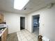 Kitchen with wood cabinets and tile floor at 1011 Columbia St, Orlando, FL 32805