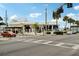 Quaint corner building with retail space and outdoor seating at 12783 Trovita Dr, Grand Island, FL 32735