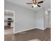 Bright living room with hardwood floors and a ceiling fan at 581 Marion Oaks Ln, Ocala, FL 34473