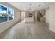 Kitchen and dining area with tile floors and lots of natural light at 309 Gina Ln, Davenport, FL 33837