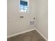 Laundry room with tile floor and hookups for washer/dryer at 309 Gina Ln, Davenport, FL 33837