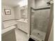 Bathroom with a soaking tub and separate shower at 7582 Assembly Ln, Reunion, FL 34747