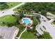 Community pool and townhouses from above at 7582 Assembly Ln, Reunion, FL 34747