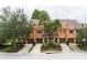 Three-unit townhome building with garages at 7582 Assembly Ln, Reunion, FL 34747