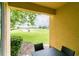 Private patio overlooks a lush green golf course at 7582 Assembly Ln, Reunion, FL 34747