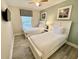 Bedroom with two twin beds, ideal for children or guests at 7582 Assembly Ln, Reunion, FL 34747