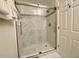 Large walk-in shower with glass enclosure at 7582 Assembly Ln, Reunion, FL 34747