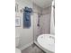 Simple bathroom with a shower and updated sink at 4205 Waterfront Pkwy, Orlando, FL 32806