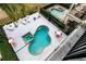 Inviting pool and spa with plenty of lounge chairs and patio furniture at 1169 Castle Pines Ct, Reunion, FL 34747