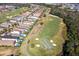 Luxury homes and golf course community aerial view at 1169 Castle Pines Ct, Reunion, FL 34747