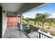 Covered balcony with stunning golf course views at 1169 Castle Pines Ct, Reunion, FL 34747