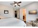 Bright bedroom with ensuite bathroom access and a media room at 1169 Castle Pines Ct, Reunion, FL 34747