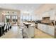 Spacious kitchen with an island, stainless steel appliances, and granite countertops at 1169 Castle Pines Ct, Reunion, FL 34747