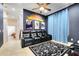 Home theater with comfortable seating and large screen at 1169 Castle Pines Ct, Reunion, FL 34747
