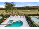 Private pool and spa with plenty of lounging space at 1169 Castle Pines Ct, Reunion, FL 34747