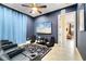 Home theater with reclining seats and large TV at 1169 Castle Pines Ct, Reunion, FL 34747