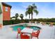 Inviting pool and spa with patio furniture, ideal for relaxation and entertaining at 1169 Castle Pines Ct, Reunion, FL 34747