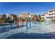 Fun community pool with water features for  at 1169 Castle Pines Ct, Reunion, FL 34747