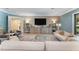 Spacious living room with comfortable seating and large TV at 5121 Latrobe Dr, Windermere, FL 34786