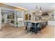 Bright kitchen with large island, custom cabinetry, and access to adjacent dining area at 5121 Latrobe Dr, Windermere, FL 34786