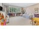 Charming bedroom with a playful design and plenty of natural light at 5121 Latrobe Dr, Windermere, FL 34786