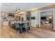 Open kitchen features a large island, stone accent wall, and high-end finishes at 5121 Latrobe Dr, Windermere, FL 34786