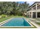 Stunning rectangular pool with fountain and patio at 5121 Latrobe Dr, Windermere, FL 34786