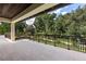 Private balcony overlooking lush greenery and offering serene outdoor space at 5121 Latrobe Dr, Windermere, FL 34786