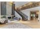 Two-story living room with fireplace and hardwood floors at 5121 Latrobe Dr, Windermere, FL 34786