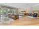 Spacious main bedroom with hardwood floors, fireplace, and access to a private balcony at 5121 Latrobe Dr, Windermere, FL 34786
